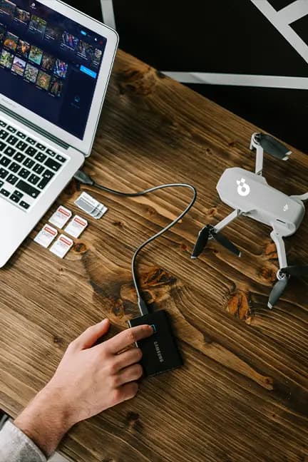 Desk setup with drone and laptop